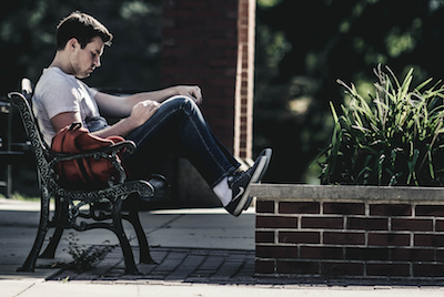 student studying outside